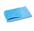 Petananda ice-silk cooling mat in blue, folded to show the mesh underside