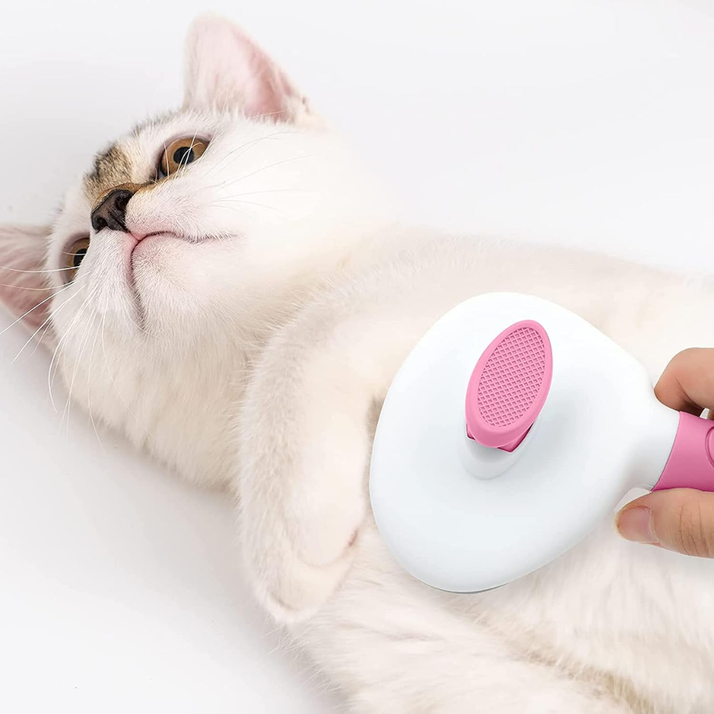 Petananda Cat Brushes For Indoor Cats, Dog Brush For Shedding With Metal Cat Comb, Self Cleaning Pet Hair Brush With Release Button For Grooming Kitten — in use