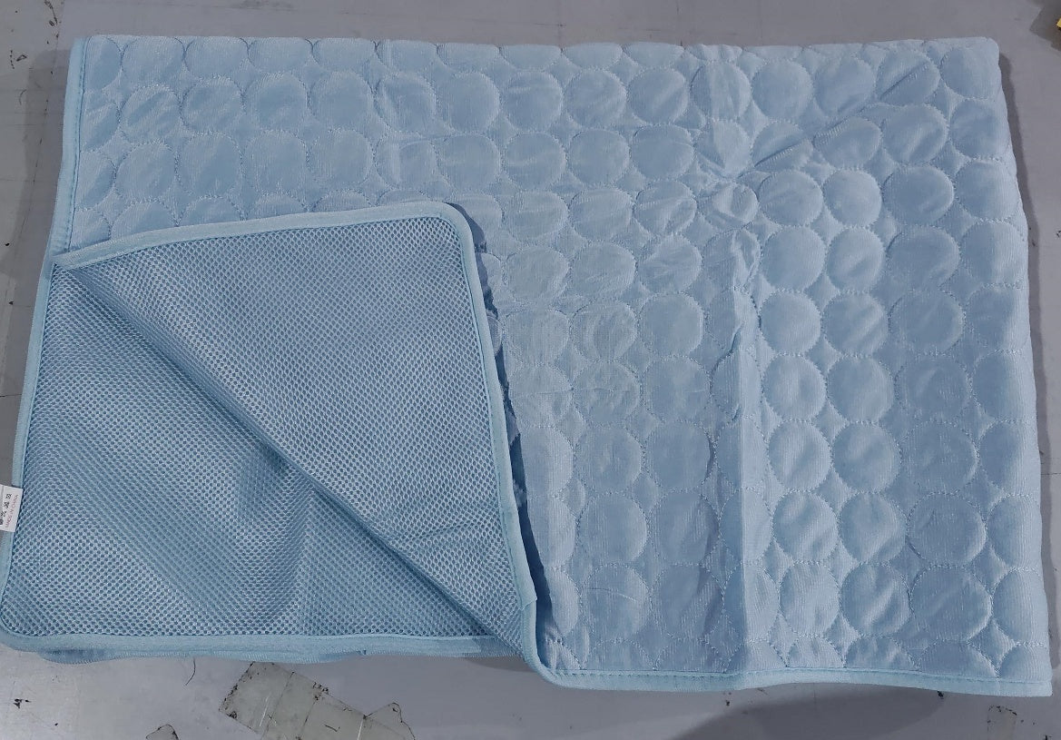 Petananda ice-silk cooling mat laid flat, showing the quilted top and mesh backing