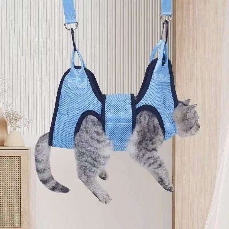 Petananda Pet Grooming Hammock For Cats And Dogs With A Hanging Nail-clipping Holder — in use