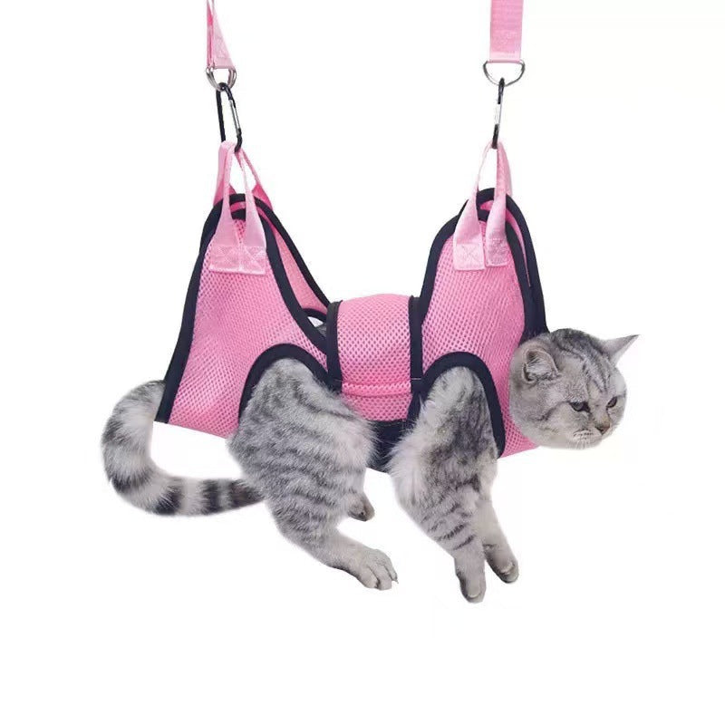 Petananda Pet Grooming Hammock For Cats And Dogs With A Hanging Nail-clipping Holder — in use